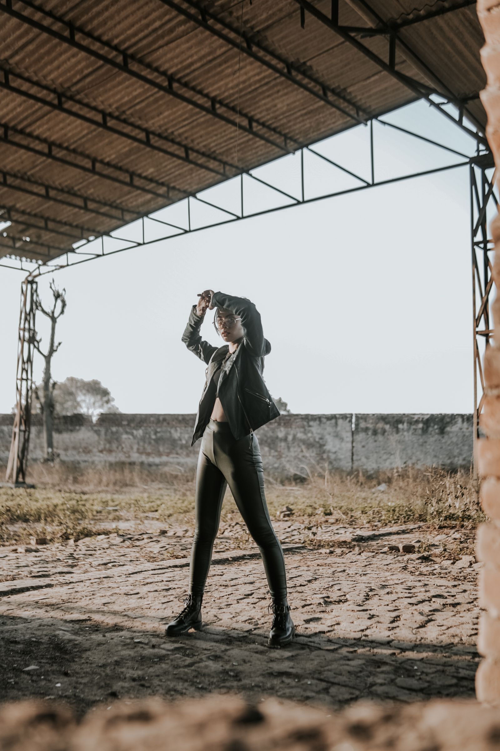 Woman in Black Leather Jacket and Denim Jeans · Free Stock Photo