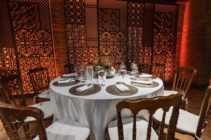 Luxurious dining setup with intricate decor and ambient lighting