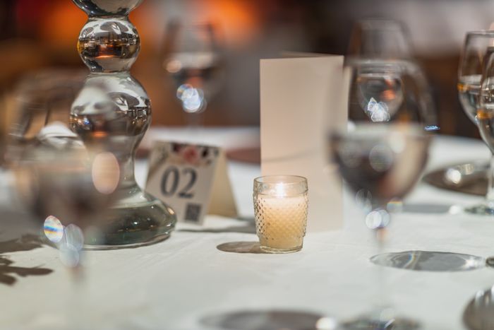 Candlelit table setting with warm ambiance