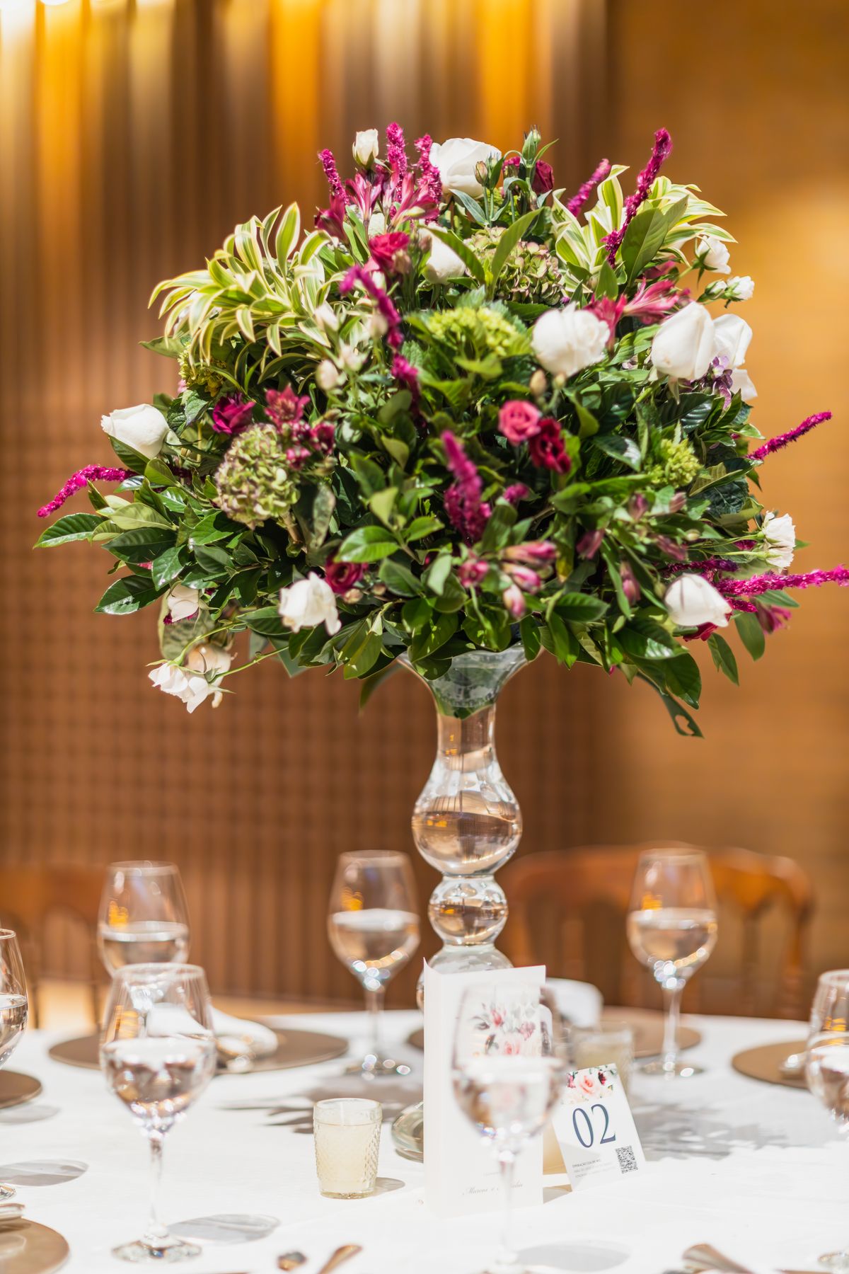 Tall pedestal floral arrangement