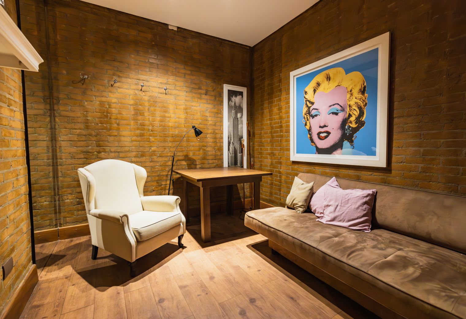 Wallpapering in Holborn — woodwork brushed to a crisp, smooth line