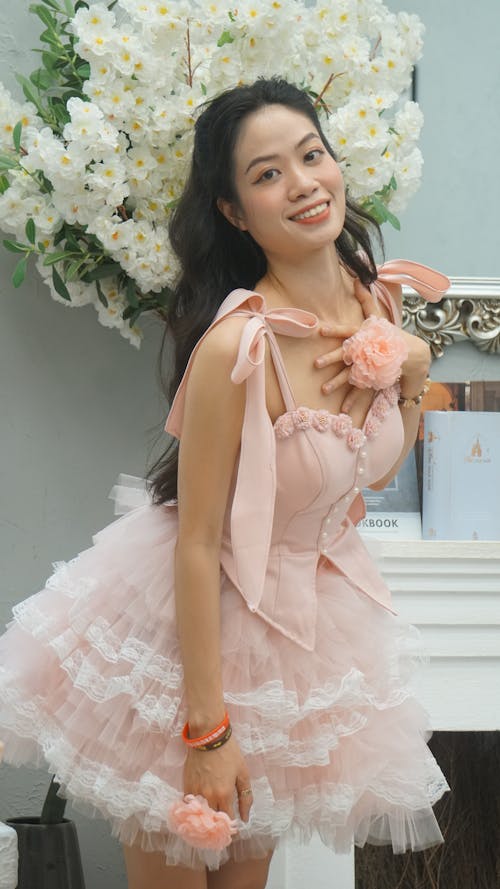 Young Woman Wearing a Pink Tulle Dress
