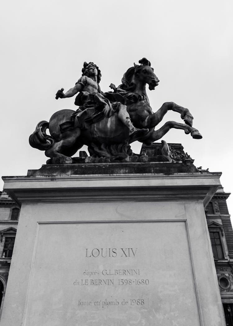 Low Angle Shot The Equestrian Statue Of Louis XIV In Versailles, France 