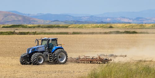Harvesting Tractor in the Field