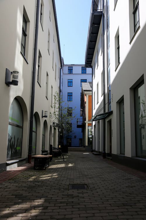 Narrow Alley Between Contemporary Buildings