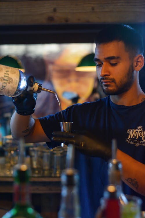 Barman Pouring Drink