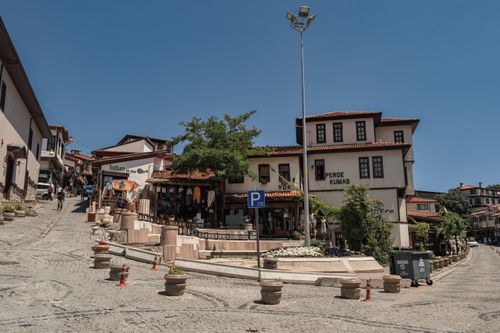 Free Explore the historic Ottoman-style streets of Ankara with clear skies and vibrant urban life. Stock Photo
