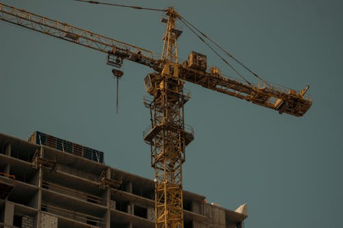 Construction Crane by Building