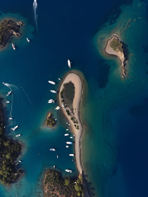 Birds Eye View of Islands with Motorboats near