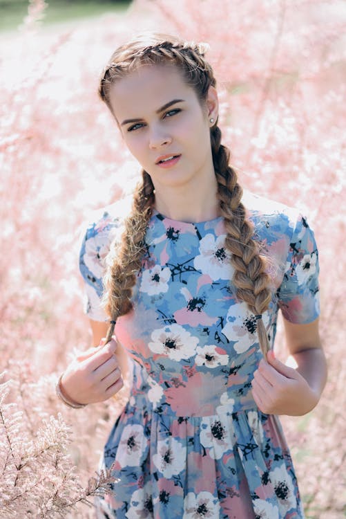 Woman Holding Her Pony Tailed Hair