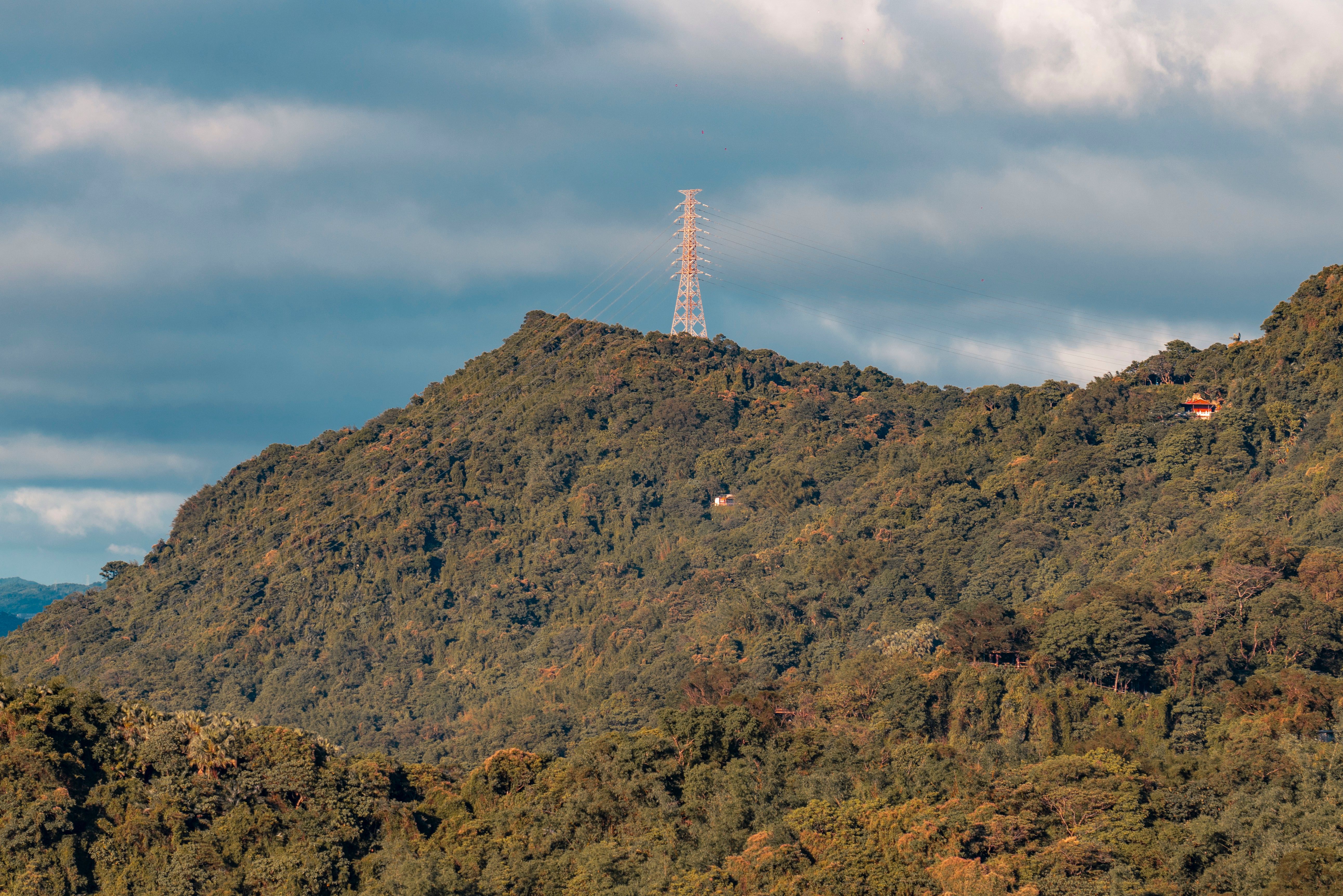 Antenna on Forested Mountain Peak · Free Stock Photo
