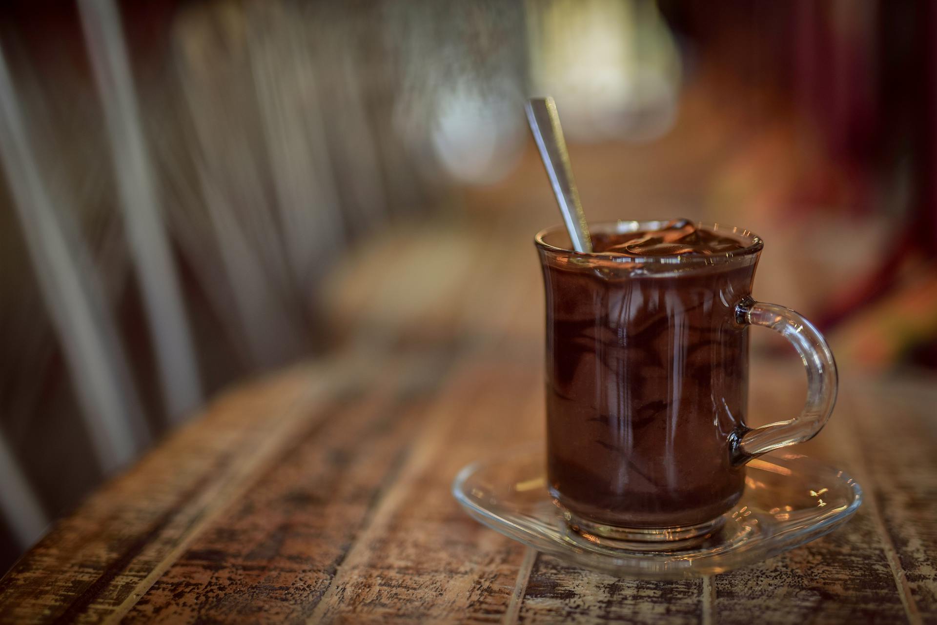 Close-Up Photo Of Glass Mug Filled With Chocolate Drink