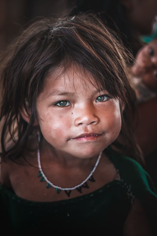 Free Close-up portrait of a young girl with innocence and charm in Ucayali, Peru. Stock Photo