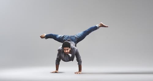 Man Performing Handstand