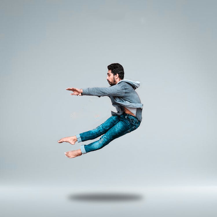 Man Jumping On Mid Air · Free Stock Photo