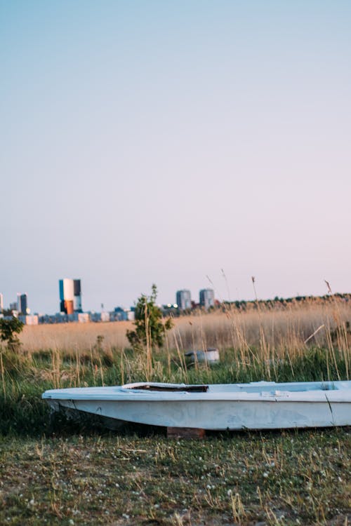 Wooden Canoe on Riverbank