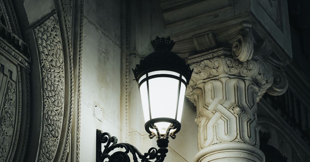 Wall Light Illuminating Column and Building Exterior · Free Stock Photo