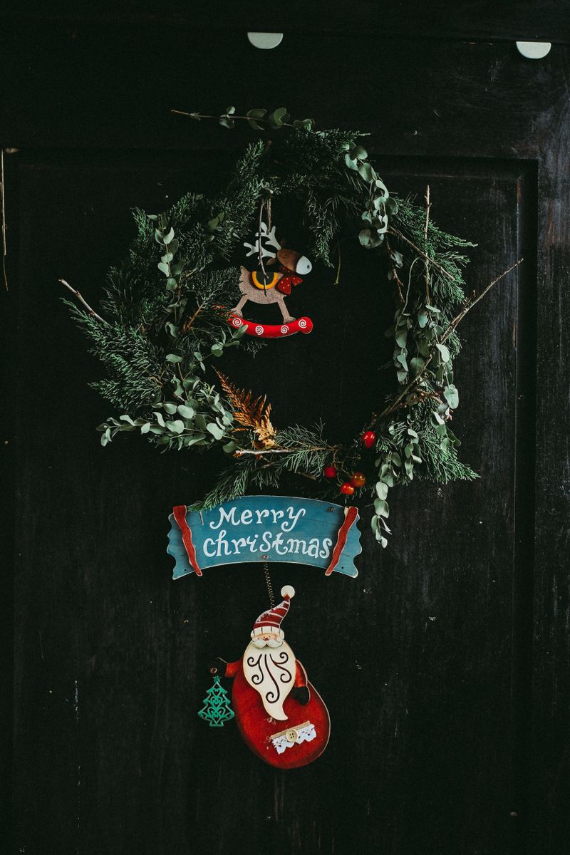 Classic evergreen Christmas wreath on a front door