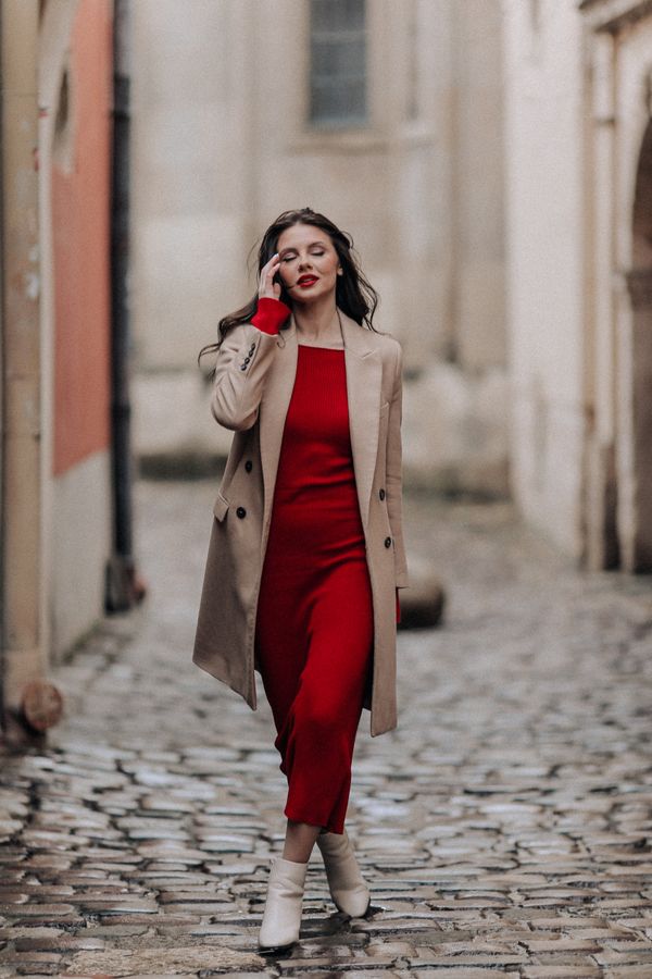 Woman in knit dress with boots