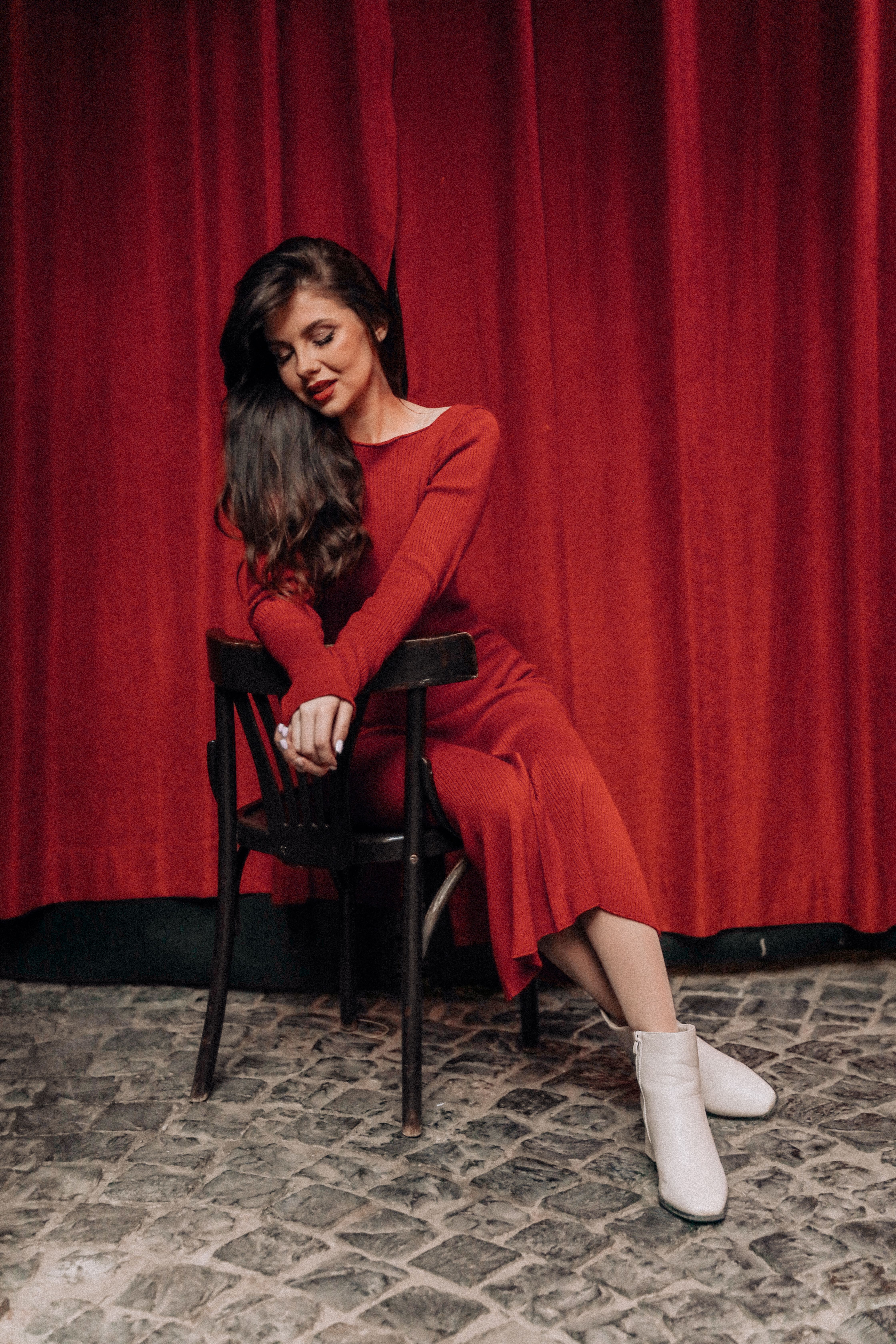 Young Woman in a Red Dress Sitting on a Chair · Free Stock Photo