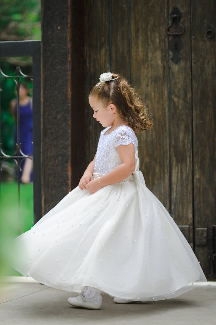 Girl On Wedding In White Elegant Dress