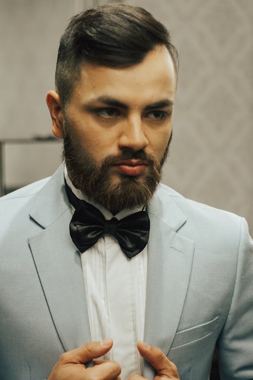 Man Posing in Black Bow Tie