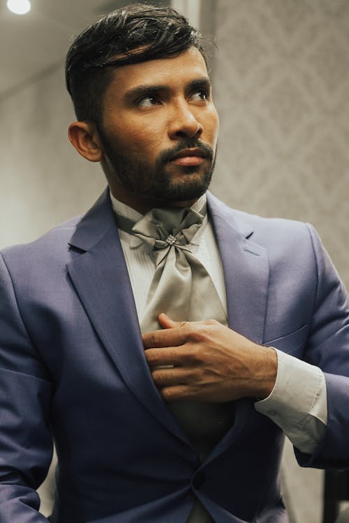 Man Standing in Elegant Suit