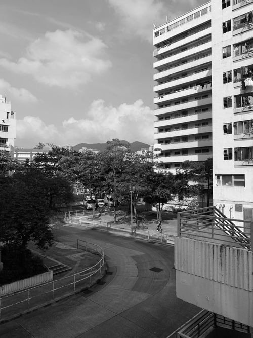 Free Black and white image of modern residential buildings in an urban setting. Stock Photo