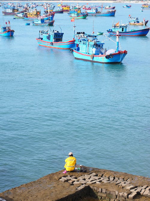 High Angle Shot of Fishing Boats on the Shore in a Fishing Village 