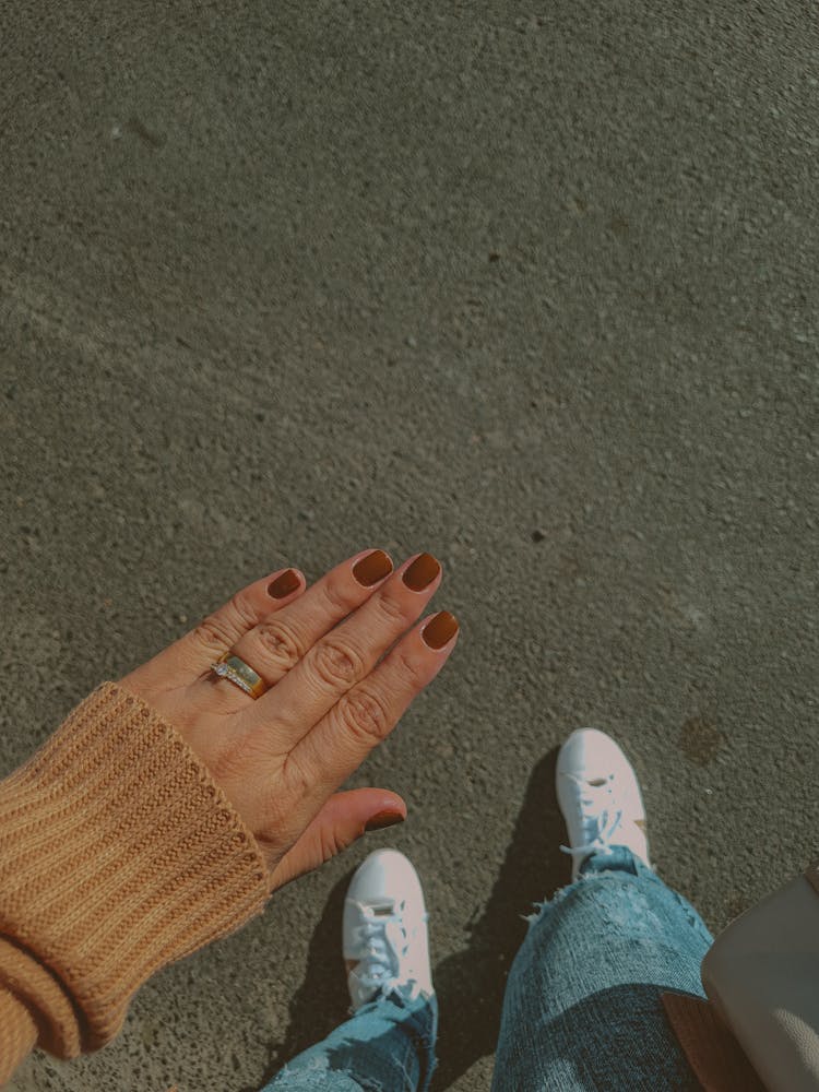 Woman Showing Her Painted Nails 