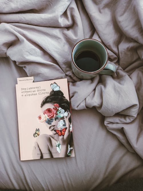 A Book and a Cup of Tea on the Bed 
