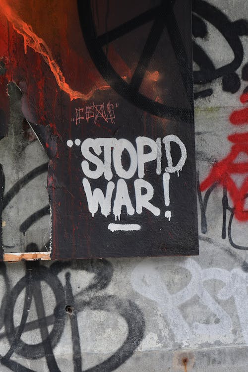 Graffiti and a Sign Stop War on the Wall 