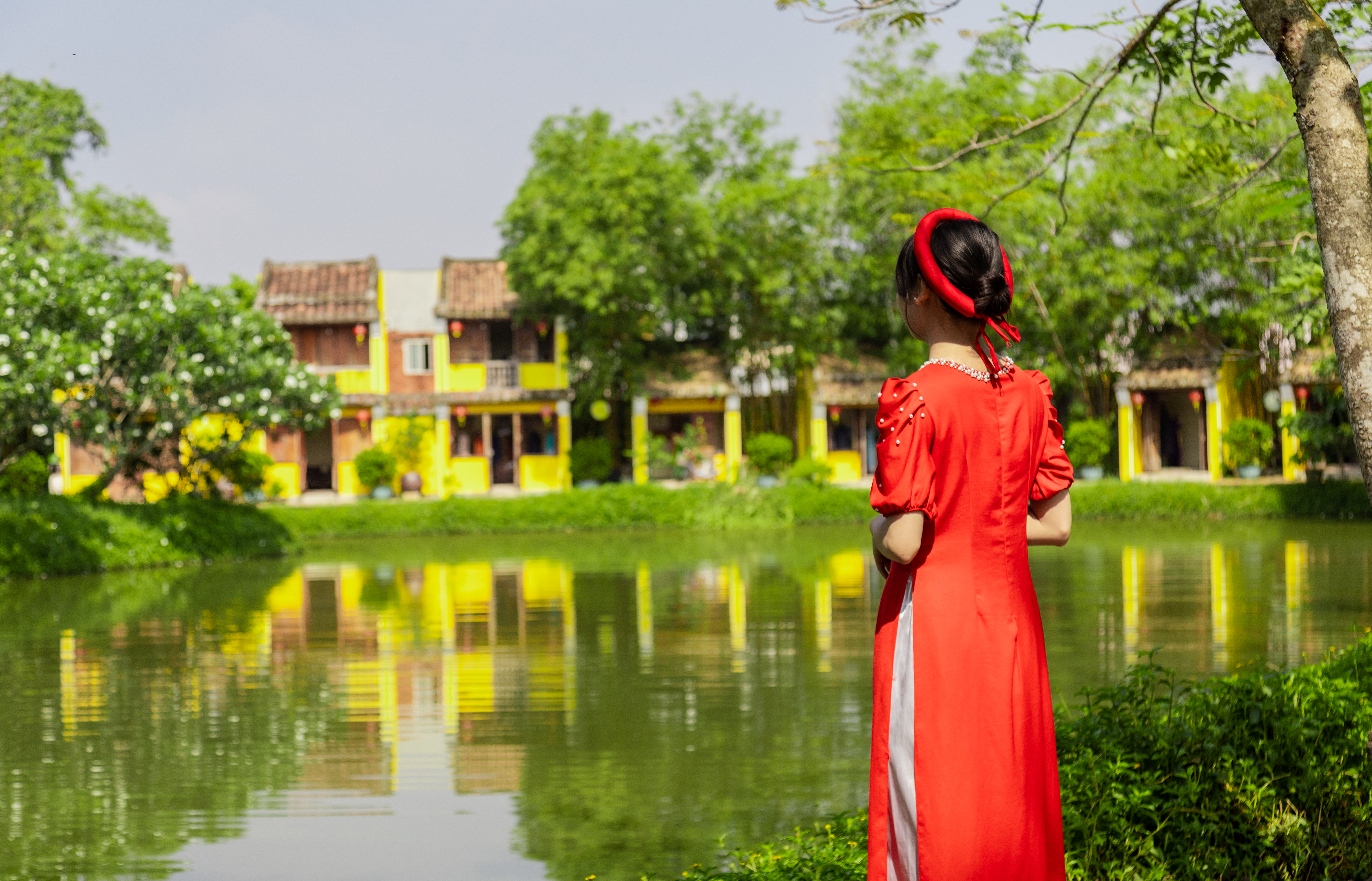 Woman in Red Dress Standing and Posing · Free Stock Photo
