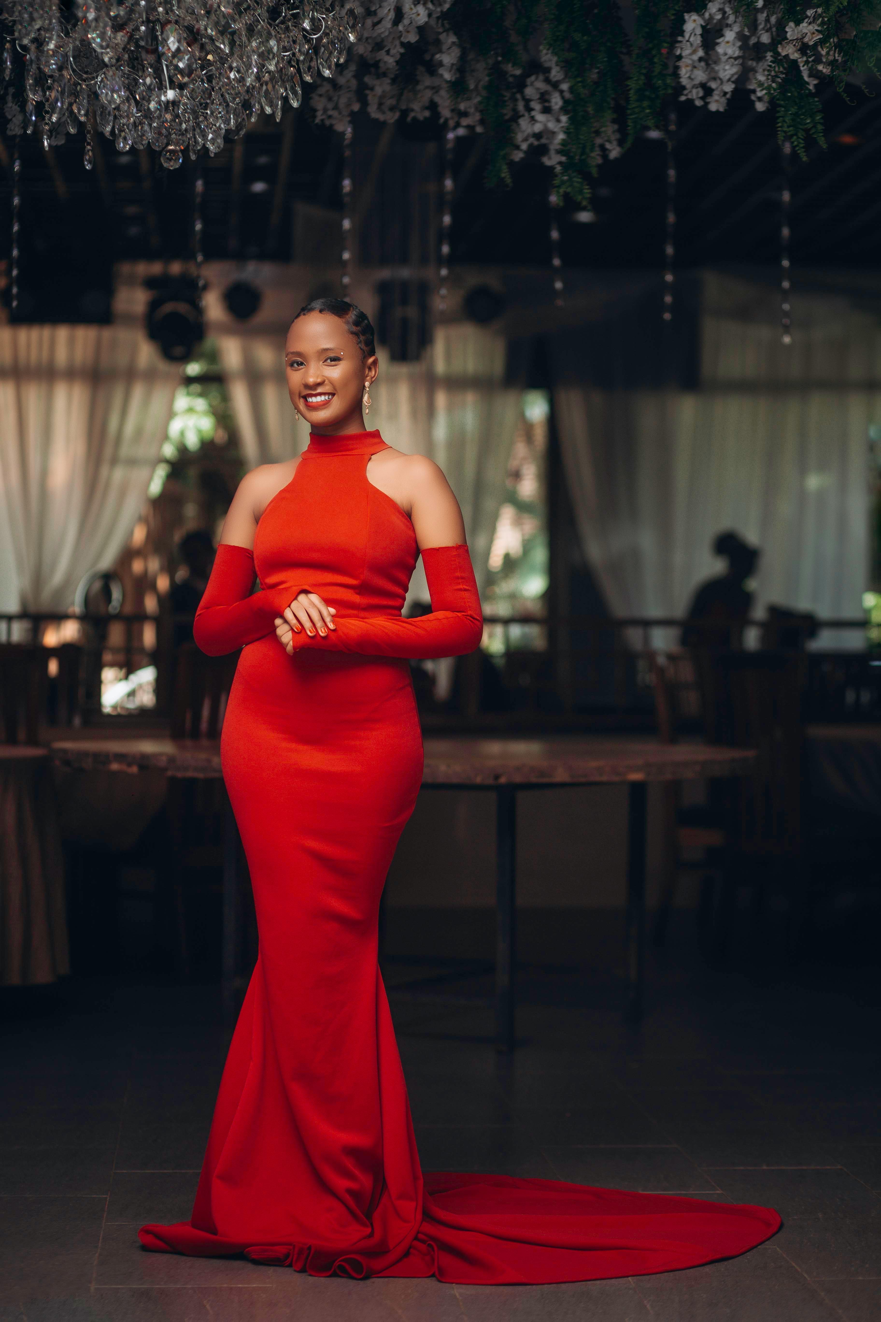 Smiling Brunette in Red Dress with Train · Free Stock Photo