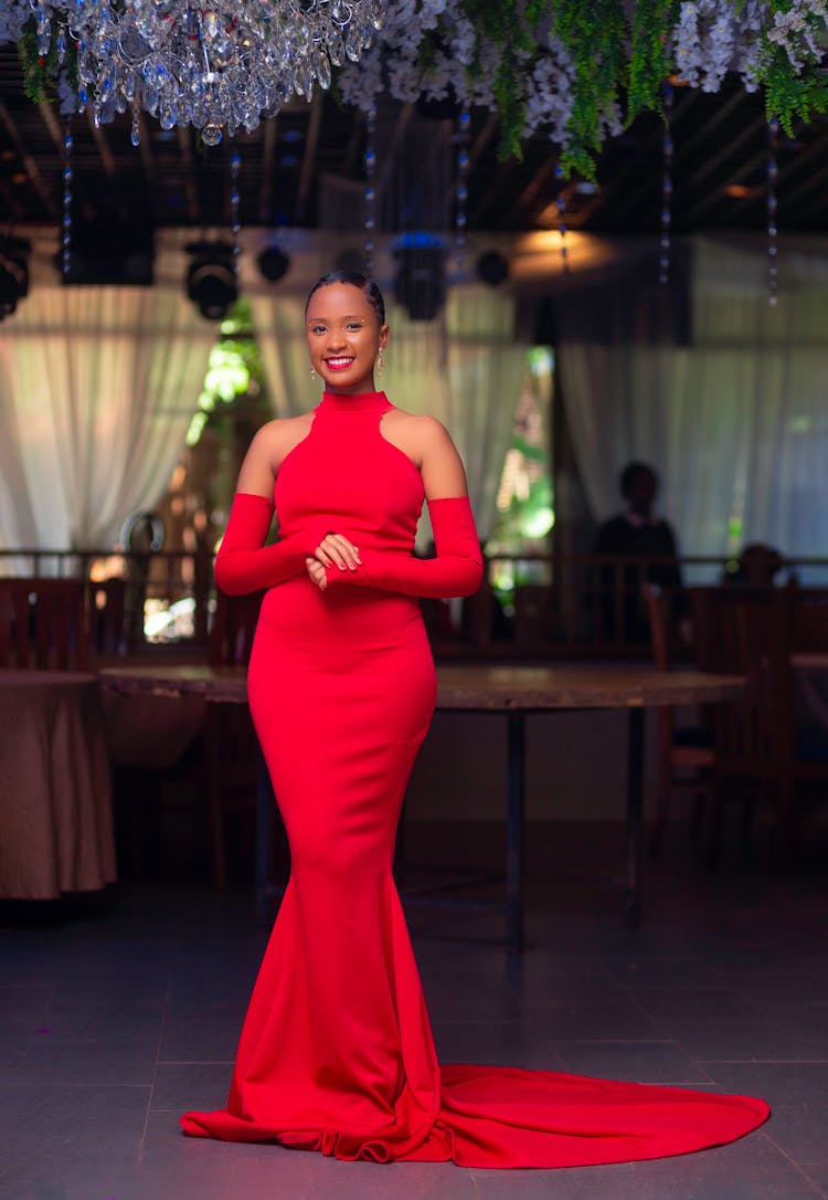 Model In Long Red Dress With Train