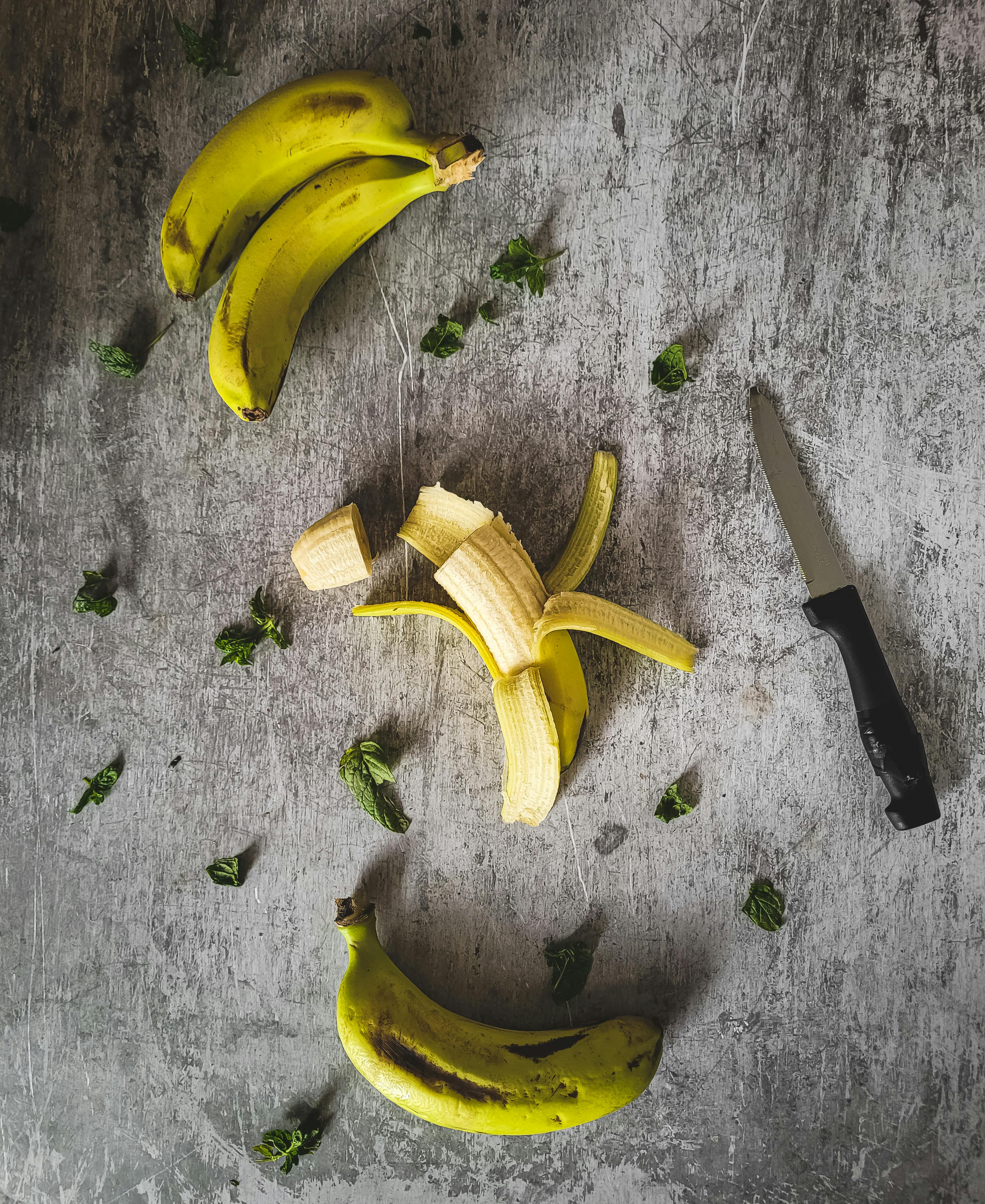 Bananas and Knife · Free Stock Photo