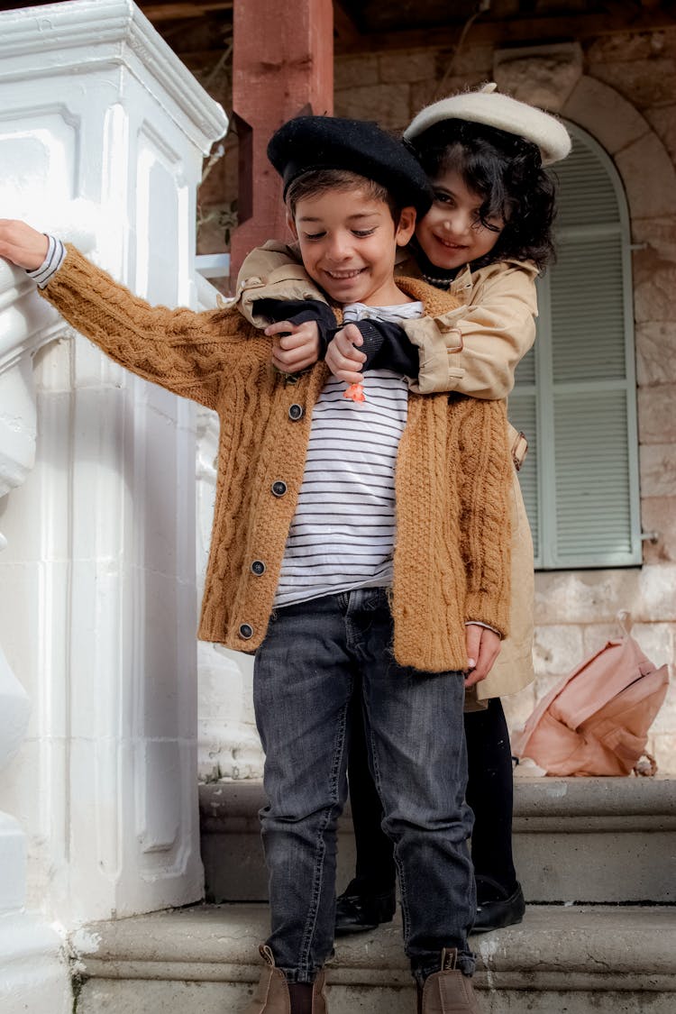 Children Posing In Hats