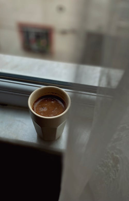 Coffee Cup on Windowsill