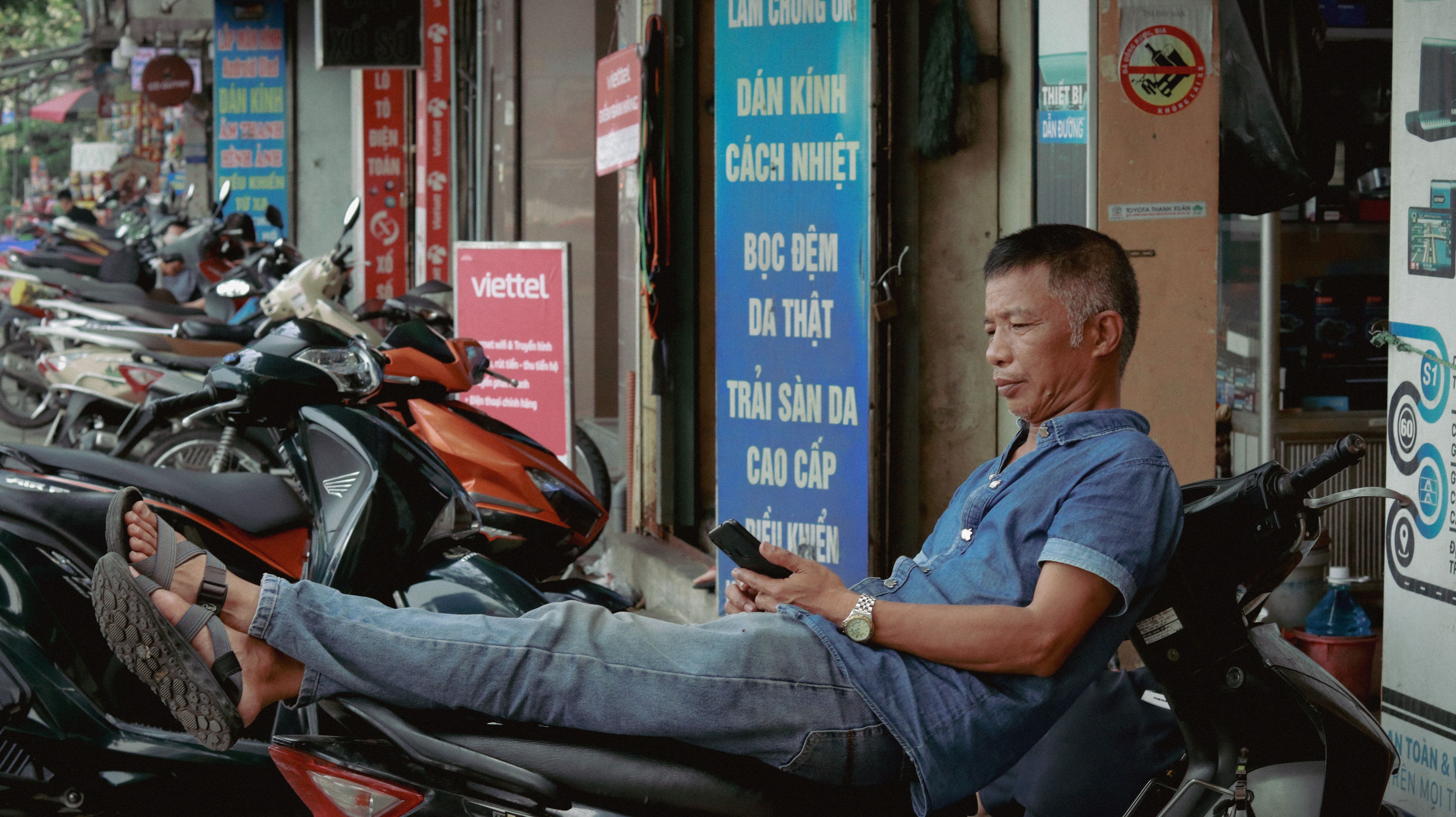 Traveler buying a SIM card at a Viettel kiosk in a Vietnam airport