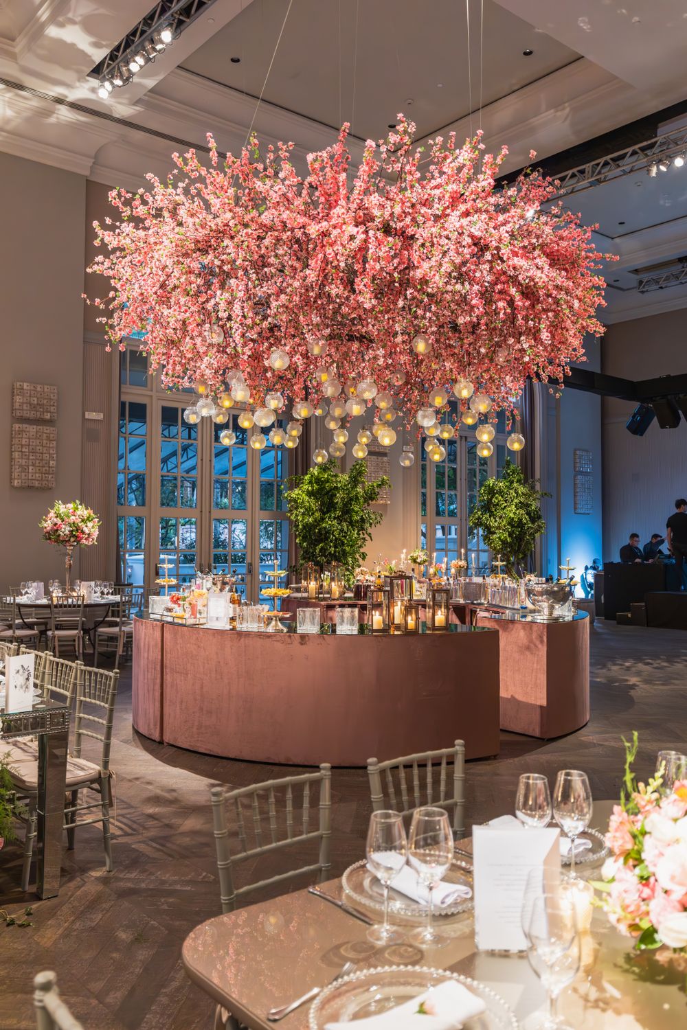 Candlelit private dining room with cherry-blossom decor