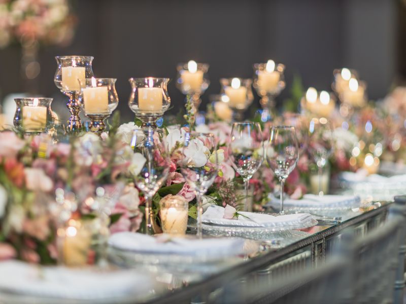 Elegant table with candles and floral arrangements