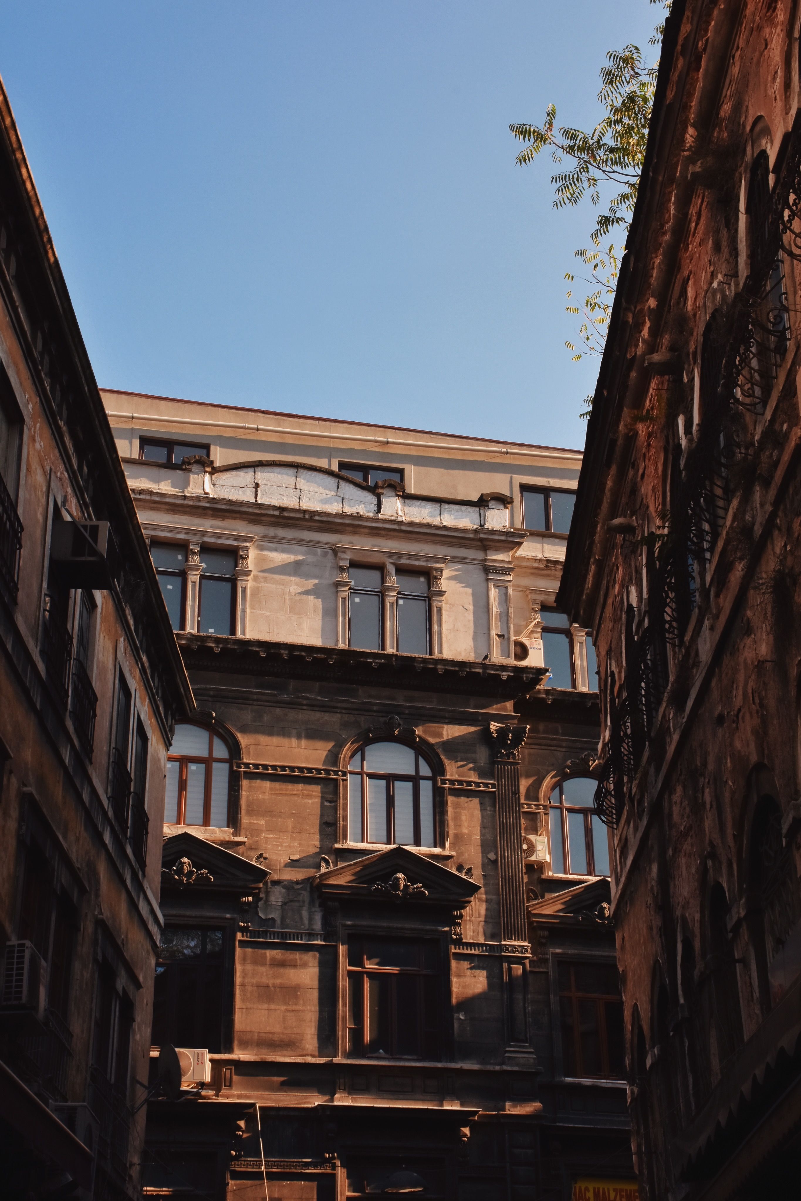 Facade of a Traditional Residential Building in City · Free Stock Photo