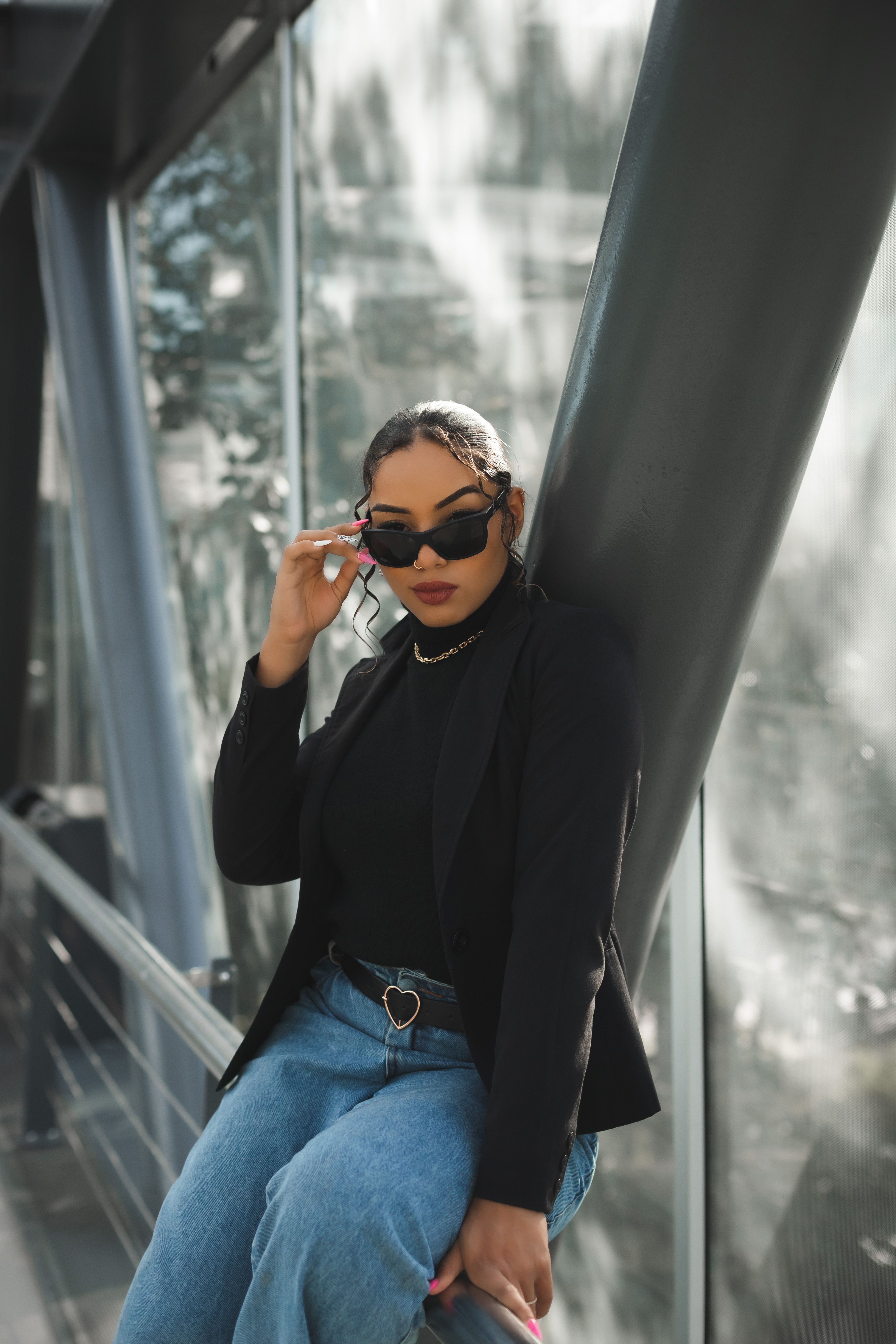 Woman Posing in Sunglasses and Black Suit · Free Stock Photo