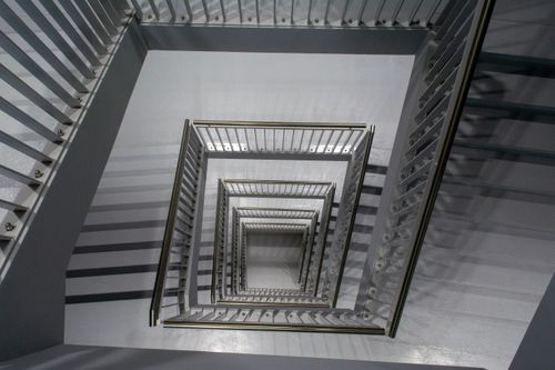 Free A geometric view of a modern staircase in Leiden showcasing contemporary design and structure. Stock Photo