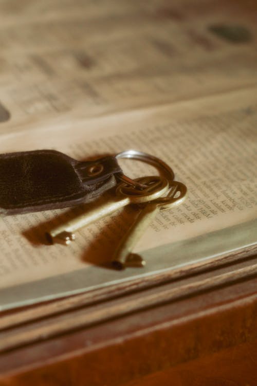 Keys with Key Chain on Newspaper