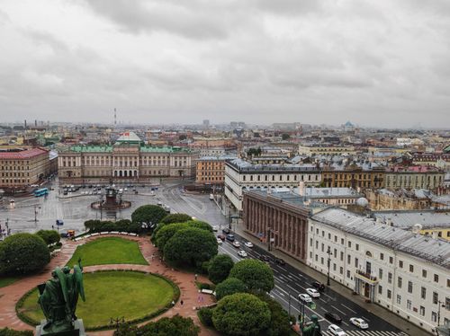 Free Overcast aerial view of Saint Petersburg cityscape featuring historic architecture and wet streets. Stock Photo
