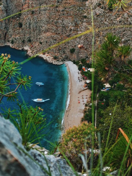 Free Discover the tranquil beauty of a secluded beach along the Muğla coastline, perfect for a relaxing getaway. Stock Photo