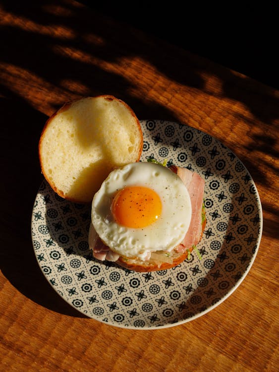 A Bun with Ham and Fried Egg