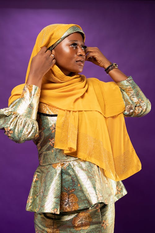 Young Woman in a Traditional Outfit and a Headscarf 