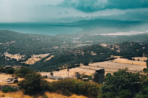 Free Breathtaking view of Assos in Türkiye, capturing the lush greenery and distant sea. Stock Photo